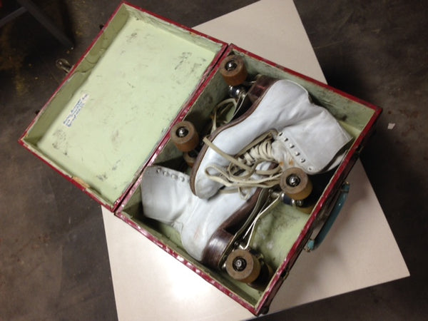 Set of Vintage woman's roller skates in original carrying case